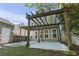 Backyard patio with a pergola, ideal for outdoor entertaining and dining at 405 Emerson Dr., Myrtle Beach, SC 29579