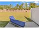 Relaxing backyard retreat with lush green lawn and a comfortable chaise lounge at 4061 Taranto Loop # A, Myrtle Beach, SC 29579