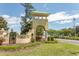 Community entrance with a decorative sign and beautiful landscaping at 4061 Taranto Loop # A, Myrtle Beach, SC 29579