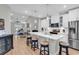 Modern kitchen with white cabinets, stainless steel appliances, island with seating at 4061 Taranto Loop # A, Myrtle Beach, SC 29579
