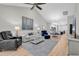 Spacious living area with neutral decor, wood floors, and an open layout to the dining area at 4061 Taranto Loop # A, Myrtle Beach, SC 29579