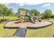 Fun playground area with slides, climbing structures, and safety mulch on a sunny day at 4061 Taranto Loop # A, Myrtle Beach, SC 29579