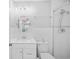 Clean white bathroom with glass-enclosed shower and modern fixtures at 410 N Waccamaw Dr. # 306, Murrells Inlet, SC 29576