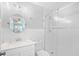 Bright, newly renovated bathroom with a walk-in shower and contemporary fixtures at 410 N Waccamaw Dr. # 306, Murrells Inlet, SC 29576