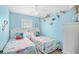 Charming twin bedroom, offering bright, nautical decor, ceiling fan and abundant light at 410 N Waccamaw Dr. # 306, Murrells Inlet, SC 29576