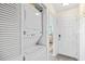 Convenient stackable washer and dryer in a hall closet next to the entrance at 410 N Waccamaw Dr. # 306, Murrells Inlet, SC 29576