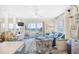Bright and airy living room with ocean views, comfortable seating, and beach-inspired decor at 410 N Waccamaw Dr. # 306, Murrells Inlet, SC 29576