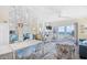 Inviting living room with ocean view, connecting dining and living space for easy entertaining at 410 N Waccamaw Dr. # 306, Murrells Inlet, SC 29576