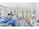 Open-concept living space showcasing a modern kitchen, dining area, and cozy seating at 410 N Waccamaw Dr. # 306, Murrells Inlet, SC 29576