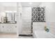 Bathroom features a separate tub, shower, white vanity, and tile flooring and walls at 422 Harbour View Dr., Myrtle Beach, SC 29579