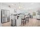 Bright and spacious kitchen with stainless steel appliances, bar stool seating, and marble countertops at 422 Harbour View Dr., Myrtle Beach, SC 29579
