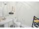 Stylish powder room featuring modern fixtures, decorative mirrors, and patterned tile flooring at 422 Harbour View Dr., Myrtle Beach, SC 29579