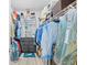 Organized walk-in closet with shelving, drawers, racks, and athletic apparel and shoes at 422 Harbour View Dr., Myrtle Beach, SC 29579