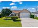 Charming single-story home featuring a well-maintained lawn, two-car garage, and attractive landscaping at 466 Wampee St. Nw, Calabash, NC 28467