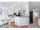 Bright kitchen with granite countertops, white cabinets, stainless steel appliances, and an open floorplan at 466 Wampee St. Nw, Calabash, NC 28467