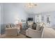 Bright living room featuring carpet floors, vaulted ceilings, and neutral wall paint at 466 Wampee St. Nw, Calabash, NC 28467