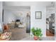 Open-concept living room with neutral paint, vaulted ceiling, and seamless flow to the kitchen at 466 Wampee St. Nw, Calabash, NC 28467