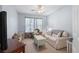 Cozy living room with soft lighting, plush seating, and a relaxed atmosphere at 466 Wampee St. Nw, Calabash, NC 28467