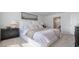 Relaxing bedroom with soft lighting, stylish accents, and access to en-suite bathroom at 500 Scarlet Sage Dr., Conway, SC 29527