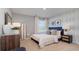 Well-lit bedroom with a comfortable bed, nautical decor, and a stylish nightstand and dresser at 500 Scarlet Sage Dr., Conway, SC 29527