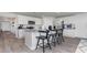 Kitchen with granite counters, stainless appliances, an island with seating, and modern finishes at 500 Scarlet Sage Dr., Conway, SC 29527
