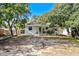 Charming single-story home featuring a quaint front porch, a well-maintained yard, and mature trees offering ample shade at 505 19Th Ave. S, North Myrtle Beach, SC 29582