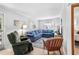 Bright living room with comfortable seating, large windows, and stylish decor at 505 19Th Ave. S, North Myrtle Beach, SC 29582