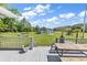 Back deck offering a scenic view of the expansive backyard and convenient access to outdoor sheds at 5086 Highway 319 E, Conway, SC 29526