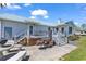 Backyard exterior featuring a deck and grilling area for outdoor enjoyment and cooking at 5086 Highway 319 E, Conway, SC 29526