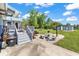 Backyard area with deck, BBQ grill, and stone picnic area at 5086 Highway 319 E, Conway, SC 29526