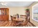 Spacious dining room with wood table and chairs, plus plenty of natural light at 5086 Highway 319 E, Conway, SC 29526