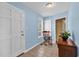 Charming entryway with rocking chair and tile floor at 5086 Highway 319 E, Conway, SC 29526