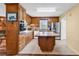 Bright kitchen with stainless steel appliances, ample counter space, and wooden cabinets at 5086 Highway 319 E, Conway, SC 29526