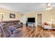 Spacious living room featuring hardwood floors, comfortable seating, and abundant natural light at 5086 Highway 319 E, Conway, SC 29526