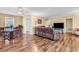 Living room and dining room combo with hardwood floors, neutral paint, and lots of space at 5086 Highway 319 E, Conway, SC 29526