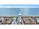Aerial view of a beachfront condo building, showcasing its prime oceanfront location and amenities at 5511 N Ocean Blvd. # 203, Myrtle Beach, SC 29577