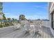 Spacious balcony featuring ocean view with plenty of seating on this spacious balcony at 5511 N Ocean Blvd. # 203, Myrtle Beach, SC 29577