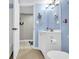 Bathroom showing a vanity, lighting, and towel holder with a nautical theme at 5511 N Ocean Blvd. # 203, Myrtle Beach, SC 29577