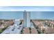 Exterior elevation of high-rise beachfront condo featuring balconies and community pool at 5511 N Ocean Blvd. # 203, Myrtle Beach, SC 29577