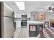 Well-equipped kitchen featuring stainless steel appliances and mosaic tile backsplash at 5511 N Ocean Blvd. # 203, Myrtle Beach, SC 29577
