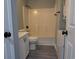 Bathroom including a vanity, toilet and tub/shower, plus a stackable washer dryer at 573 Blue River Ct. # 8-H, Myrtle Beach, SC 29579