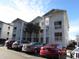 Beautiful condo building with private balconies, well-maintained landscaping, and ample parking at 573 Blue River Ct. # 8-H, Myrtle Beach, SC 29579