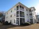 Charming condo building featuring screened porches and meticulous landscaping in a desirable community at 573 Blue River Ct. # 8-H, Myrtle Beach, SC 29579