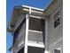 View of a condo featuring screened porches, offering a perfect blend of indoor-outdoor living at 573 Blue River Ct. # 8-H, Myrtle Beach, SC 29579