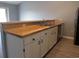 Well-lit kitchen featuring butcher block countertops, stainless steel appliances and grey flooring at 573 Blue River Ct. # 8-H, Myrtle Beach, SC 29579