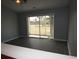 Living room featuring sliding glass door and exterior golf course views at 573 Blue River Ct. # 8-H, Myrtle Beach, SC 29579