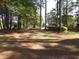 Expansive backyard with mature trees, offering privacy and natural beauty at 9500 Indigo Creek Blvd., Murrells Inlet, SC 29576