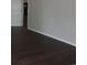 Bedroom with wood floors and neutral color palette at 9500 Indigo Creek Blvd., Murrells Inlet, SC 29576