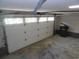 Spacious garage with white door and windows, providing plenty of natural light at 9500 Indigo Creek Blvd., Murrells Inlet, SC 29576