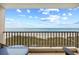 Relaxing balcony offers scenic ocean views, comfortable seating, and a peaceful retreat by the sea at 6200 N Ocean Blvd. # 203, North Myrtle Beach, SC 29582